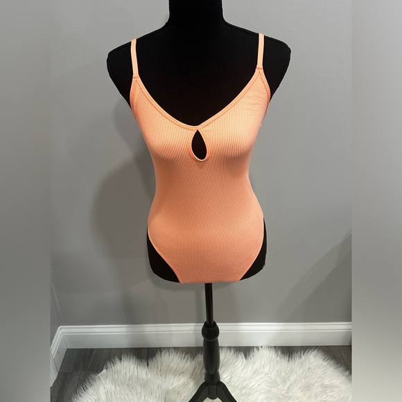 Colsie Tops - Women’s orange bodysuit